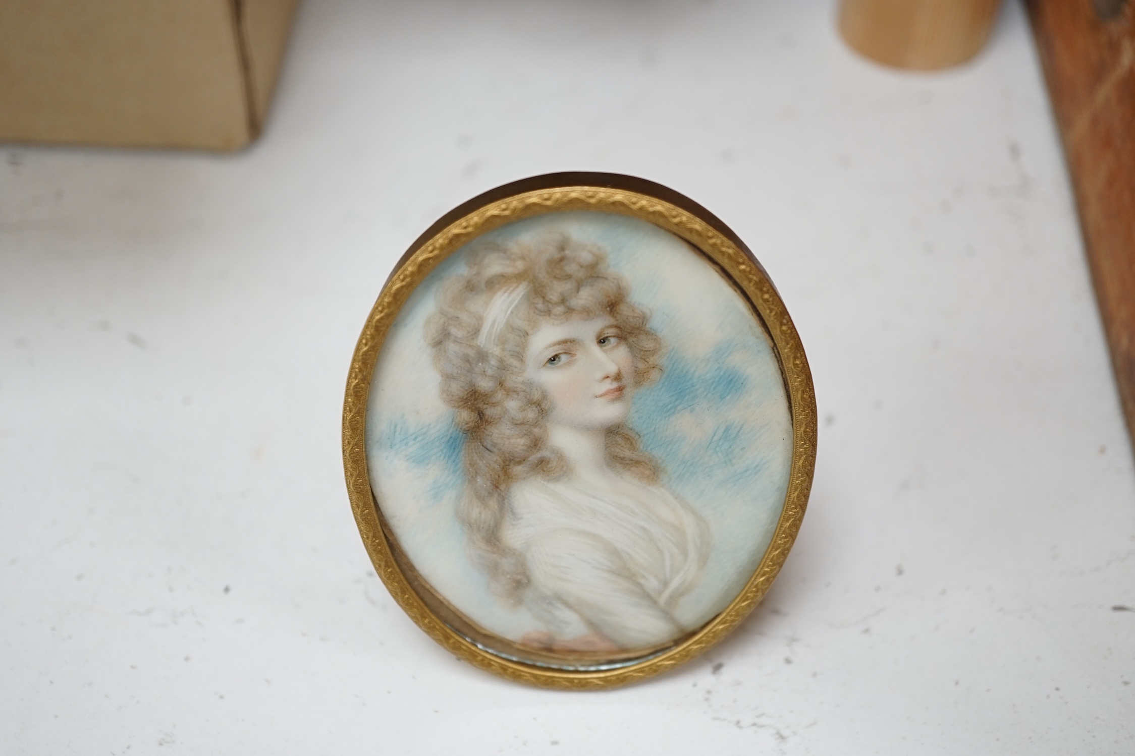 An early 19th century oval framed portrait miniature on ivory CITES Submission reference DGP5J4HH